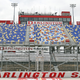 The empty stands of Darlington Raceway where NASCAR will return today.